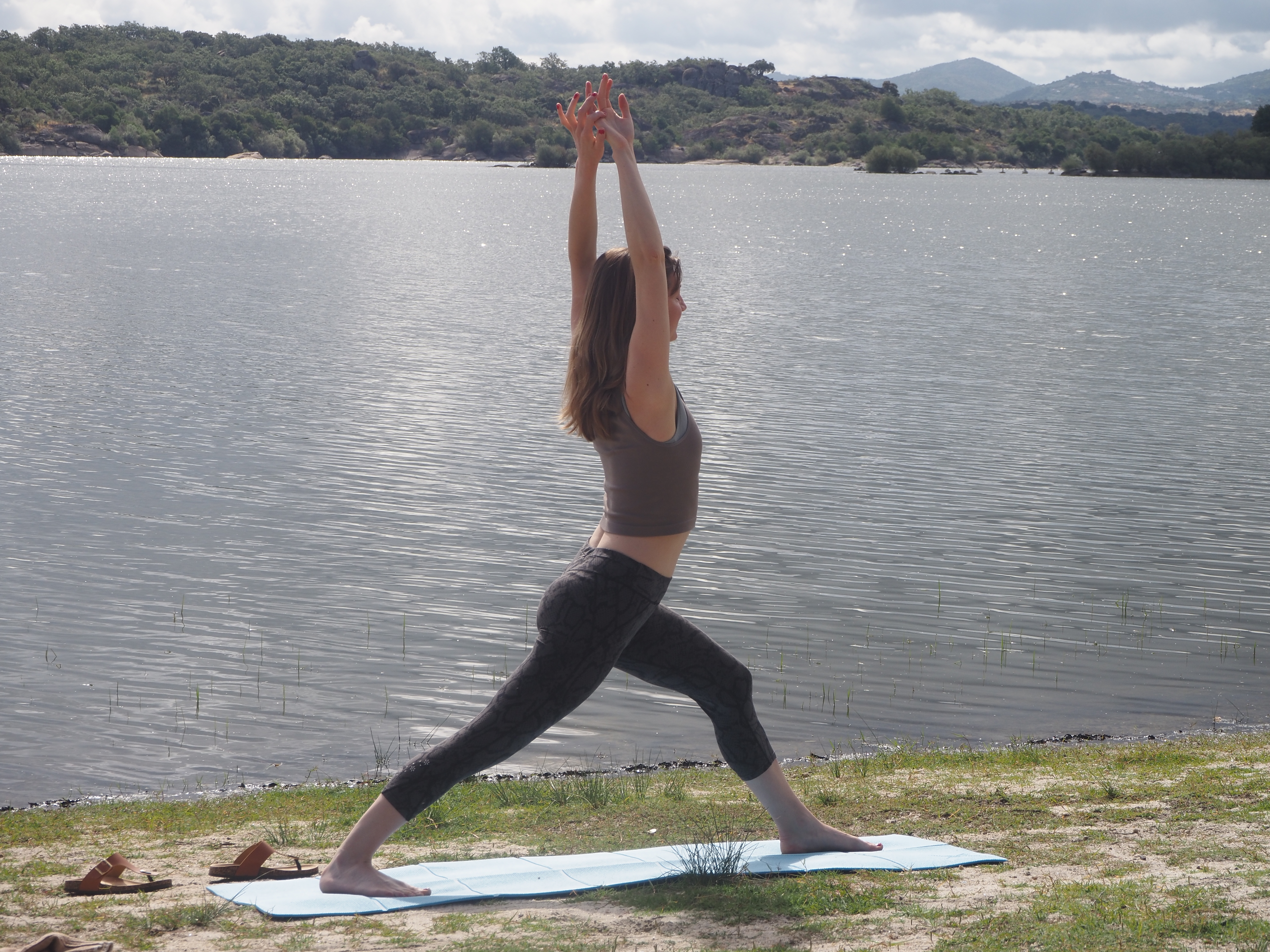 Tallulah leading a group yoga class