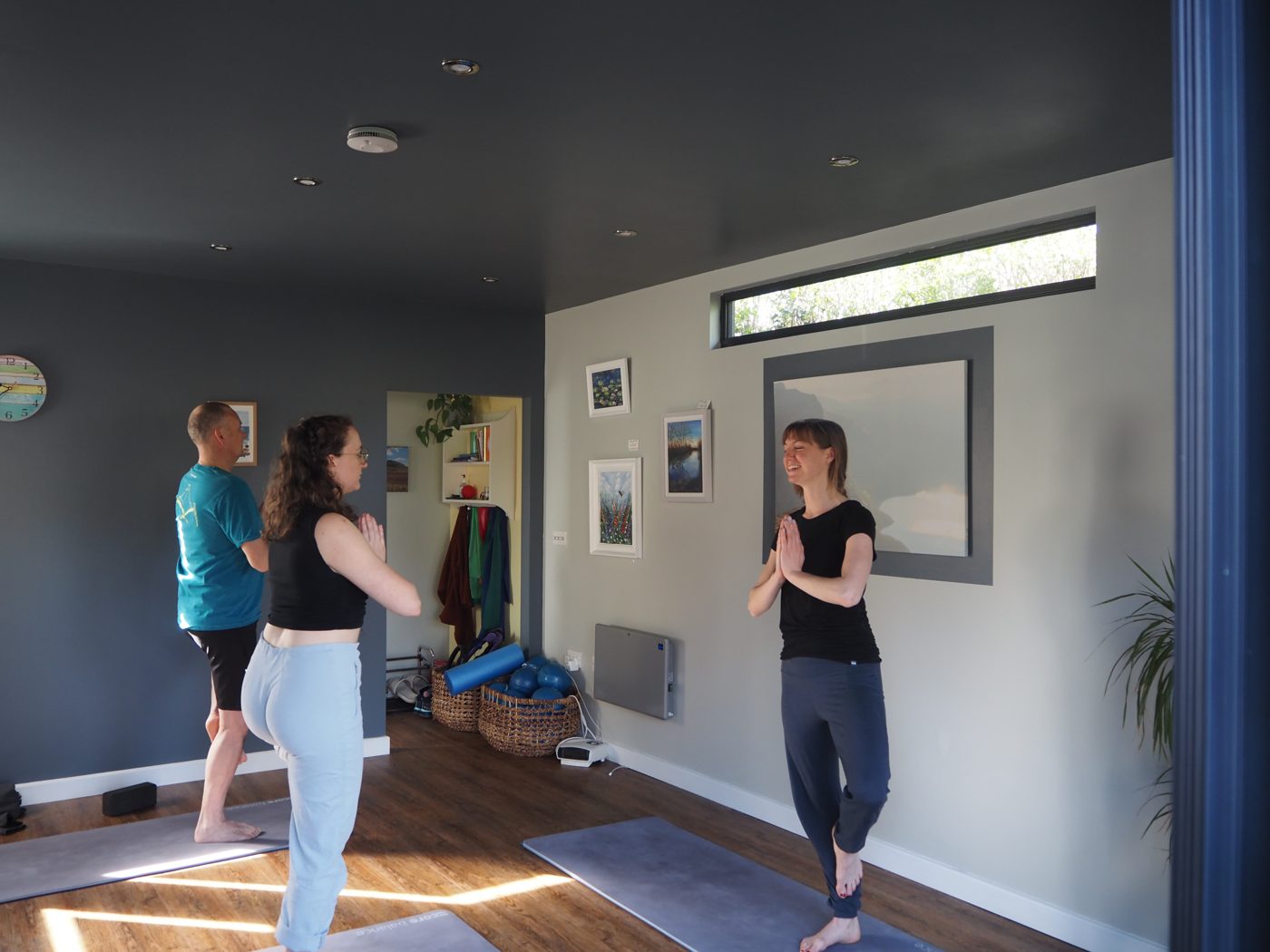 Tallulah teaching a small group in a calm studio